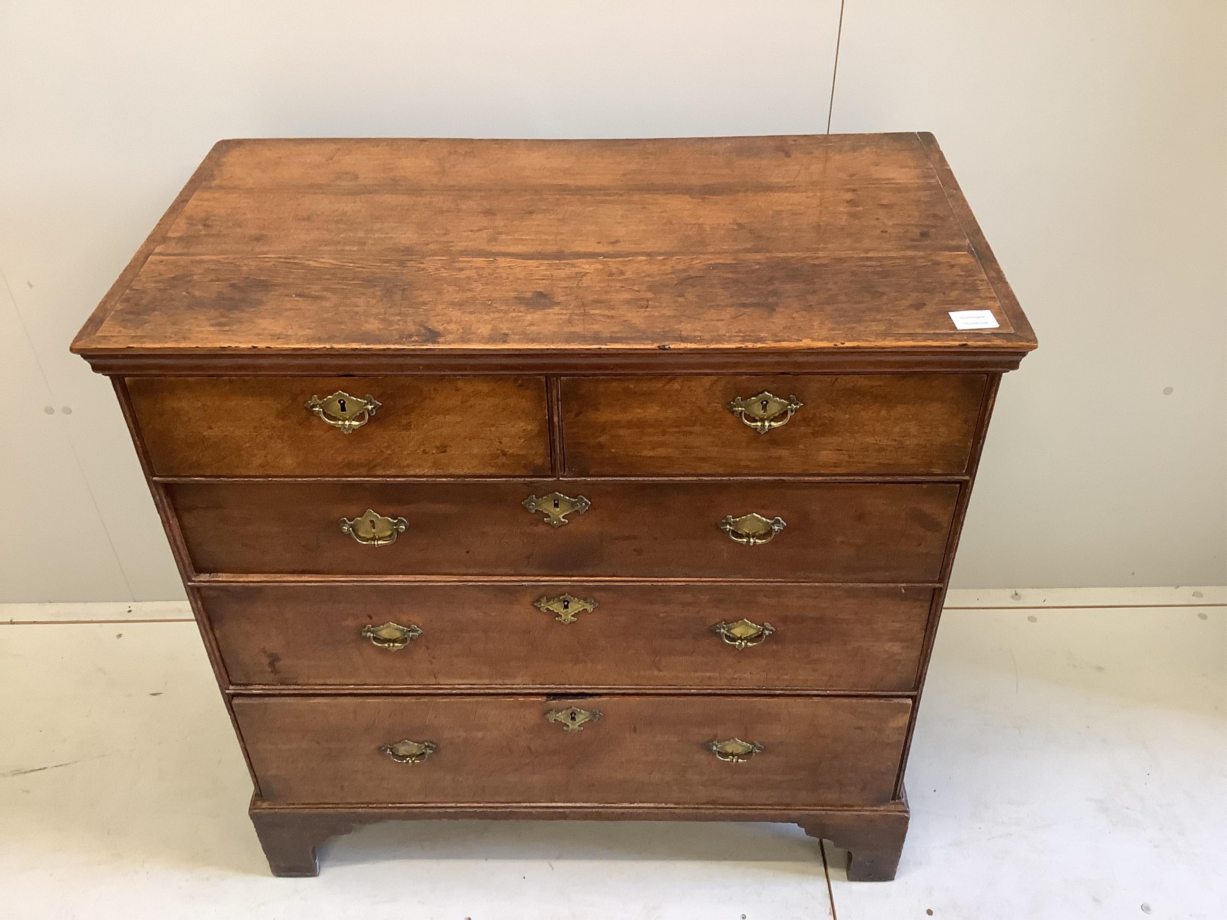 A mid 18th century oak chest, fitted with two short and three long drawers, width 93cm, depth 50cm, height 94cm. Condition - fair